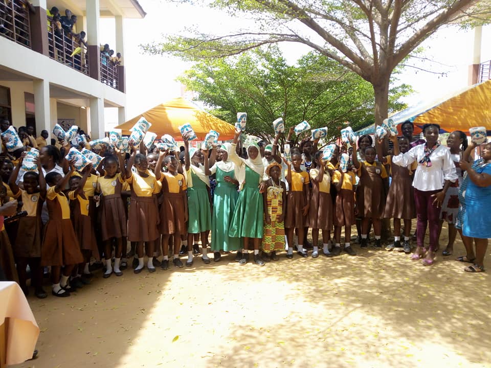 Walnut card tray with white powder coated steel divider and 3 punchout holes.